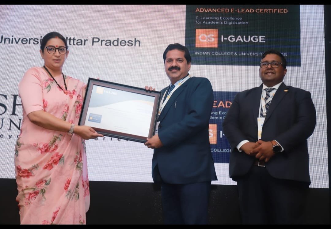 Recognition presented during a QS I-GAUGE programme.