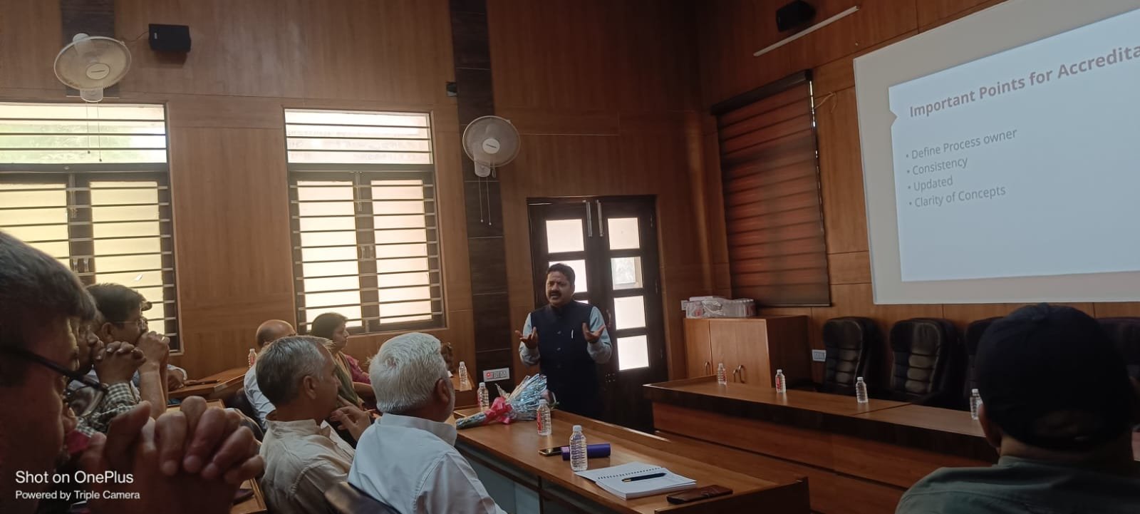 Prof. (Dr.) Mridul Dharwal addressing participants during the NAAC Accreditation Preparedness workshop at Meerut College.